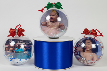 Three personalized round photo ornaments with children’s pictures and decorative bows