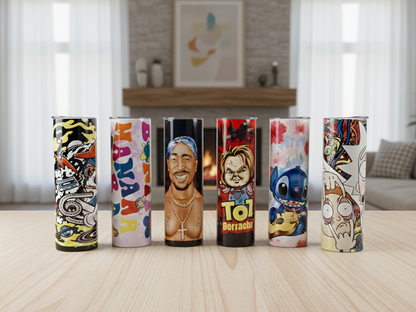 Set of colorful cylindrical products with various designs on a wooden surface.