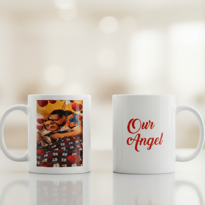 Two personalized white mugs with family photo and red Our Angel text